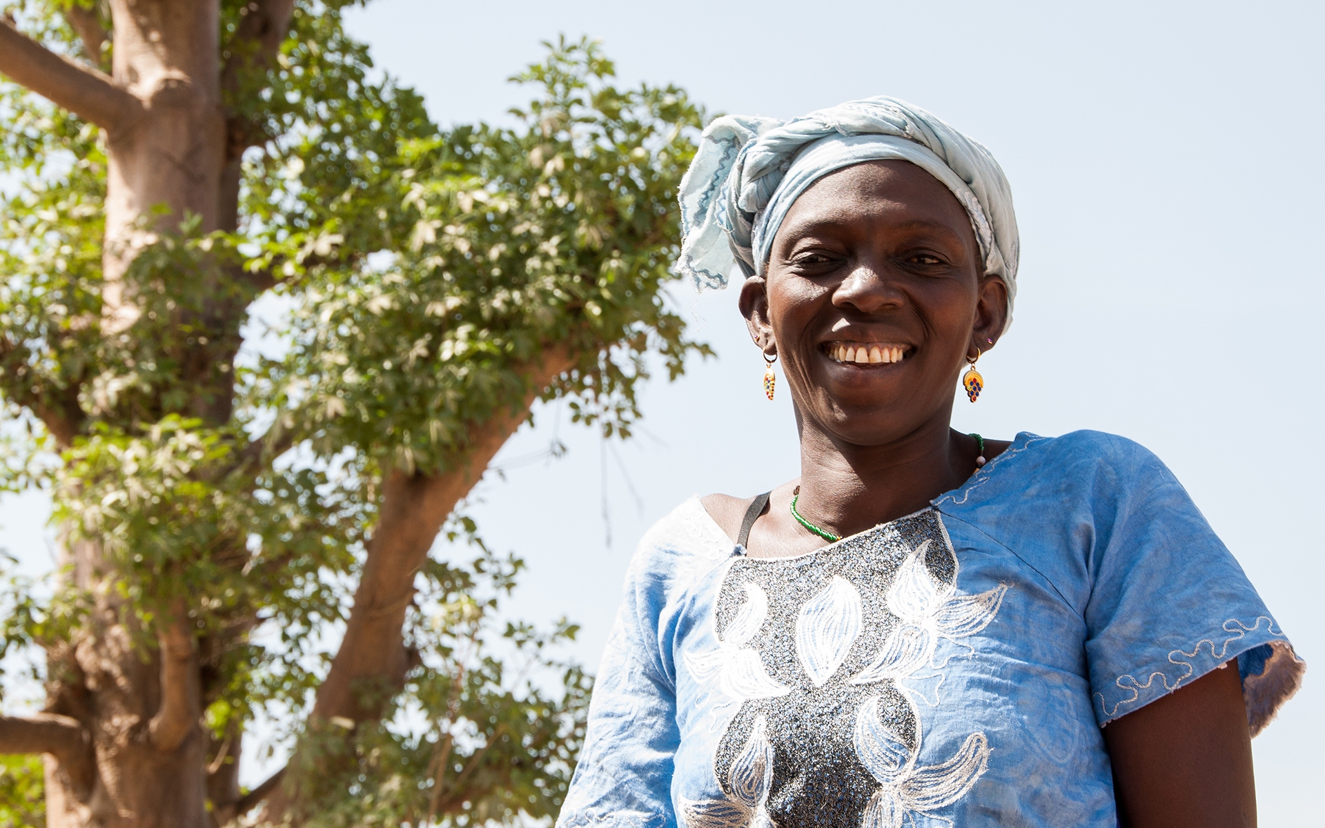 Setou, a member of Tree Aid's She Grows project, smiling.