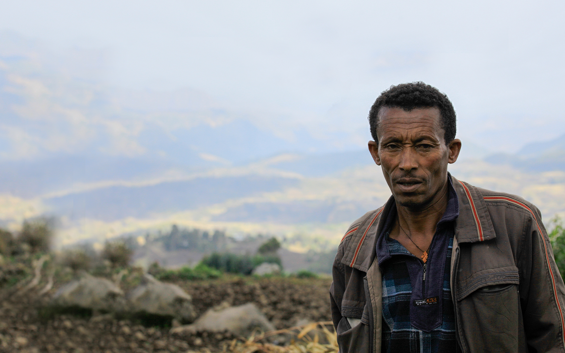 Close up of Tadesse, a man that took part in Tree Aid's Wof Washa project in Ethiopia.