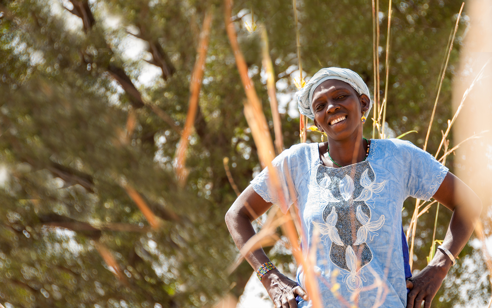 Setou, a member of Tree Aid's She Grows project, smiling.